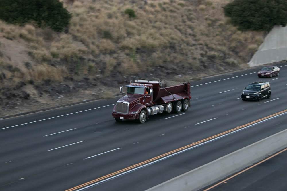 Austin, TX – Hit-and-Run Waste Management Truck Crash on Giles Lane